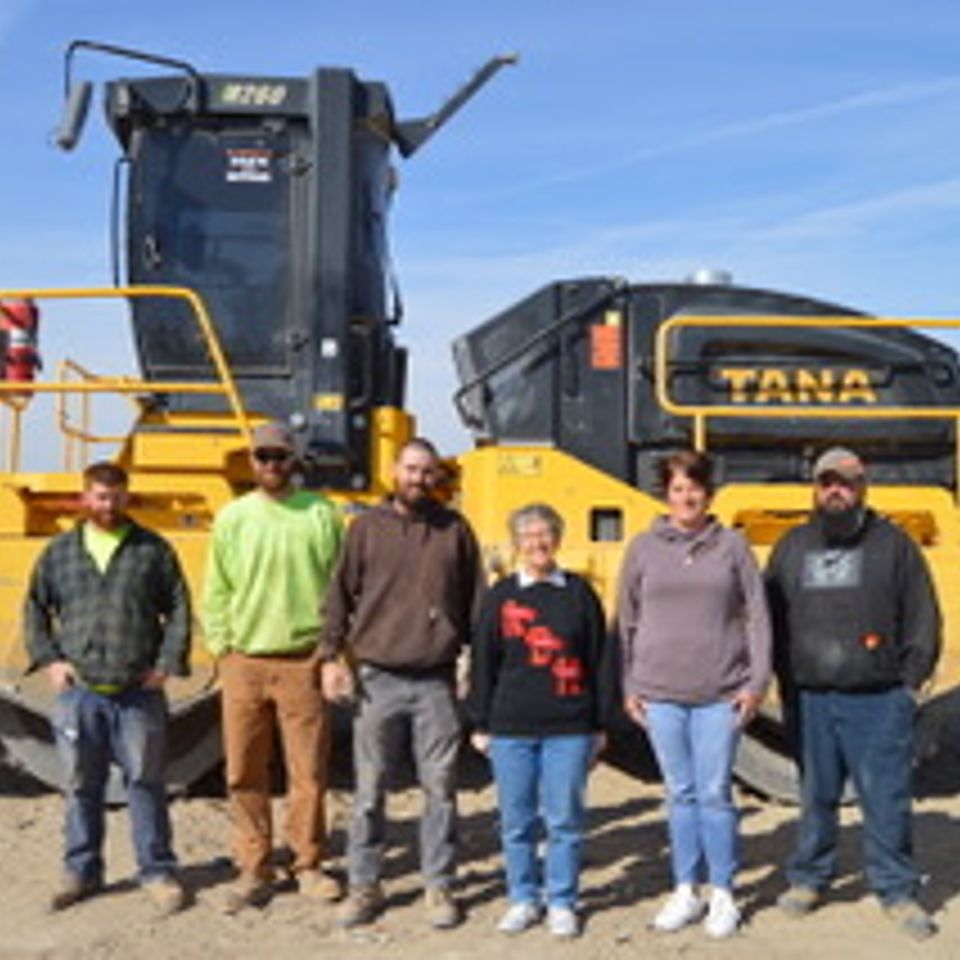 Sdc landfill staff with compactor