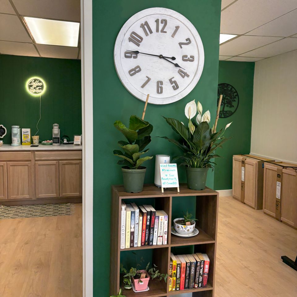Books and plants clock forest and blossom