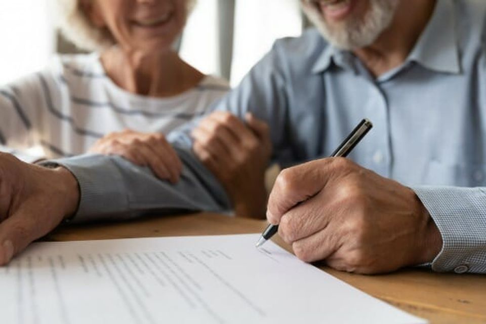 Old couple make agreement sign insurance contract picture id1211971898