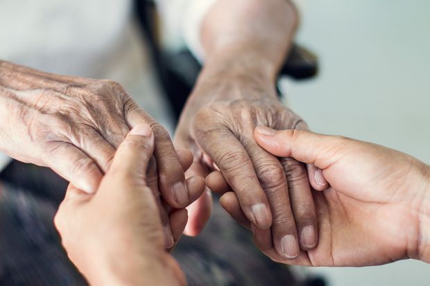 Holding caring hands