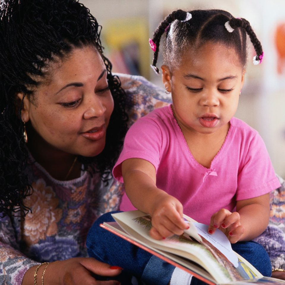 Woman and child reading