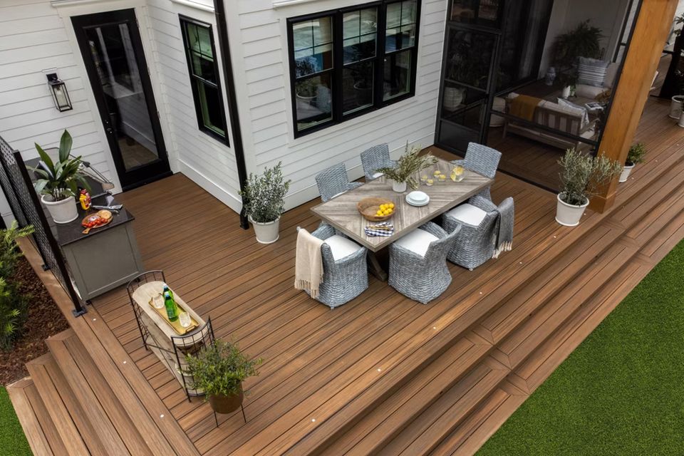 Trn wilmington 005 hg smart home backyard aerial angle dining area