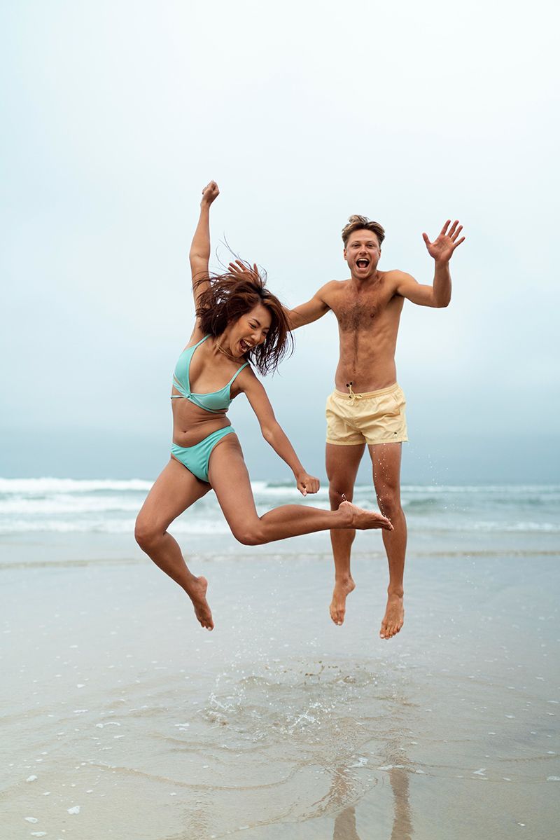 2full shot friends posing beach