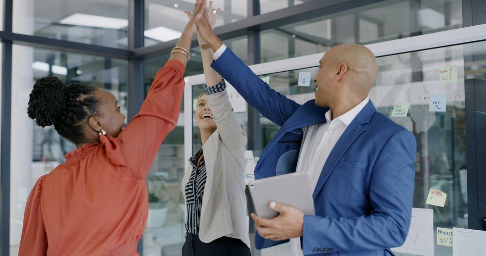 Medium vecteezy mission high five or excited business people in meeting for 77593317 medium
