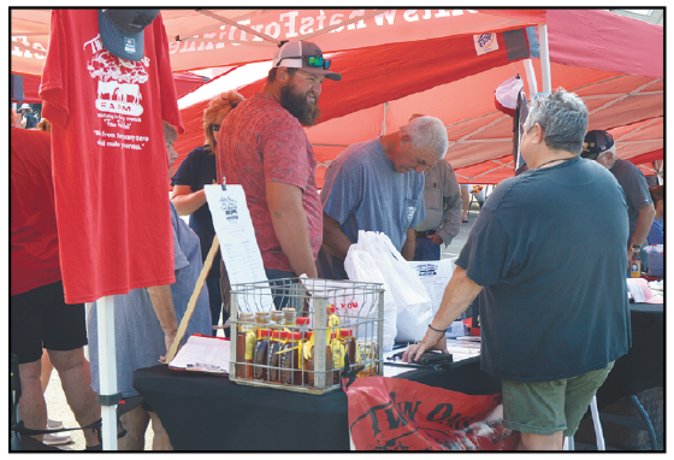 Local farmers from Twin Oaks Farm sell their products at the farmers’ market. Screen shot 2025 05 15 at 2.04.58 pm