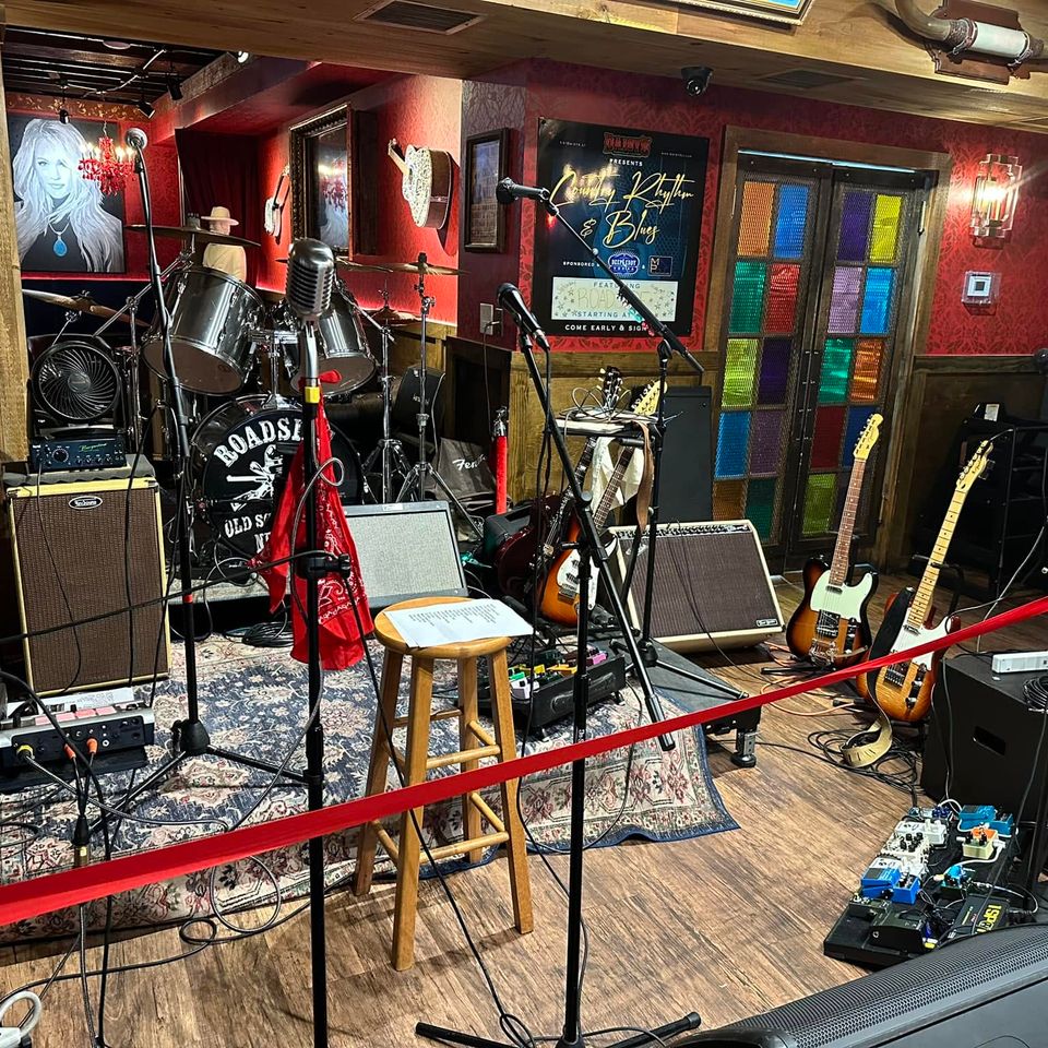 Live band stage setup with drums guitars and amplifiers ready for a pub and tavern performance on Long Island
