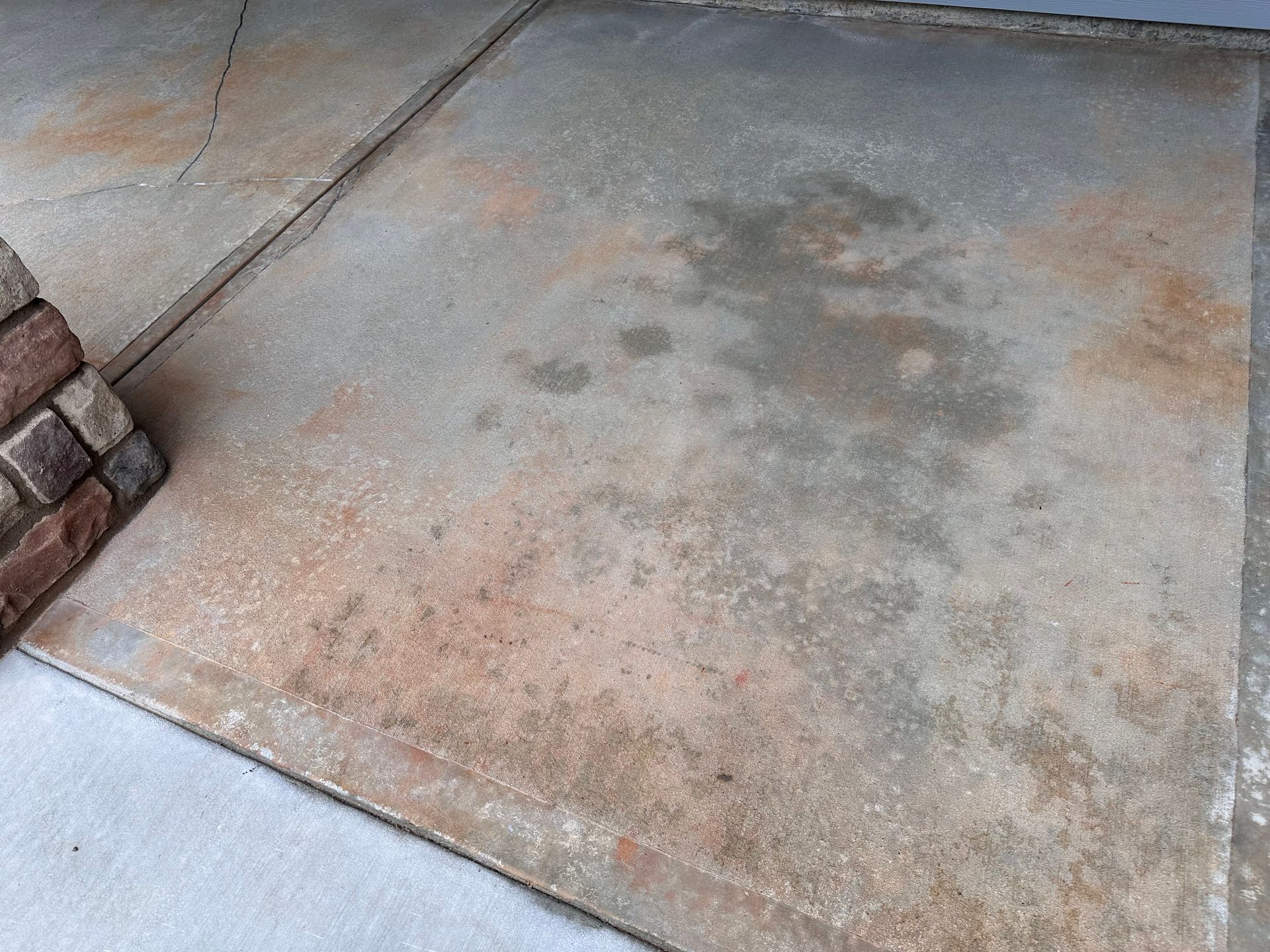 Before photo of weathered Savannah Lakes Village patio concrete