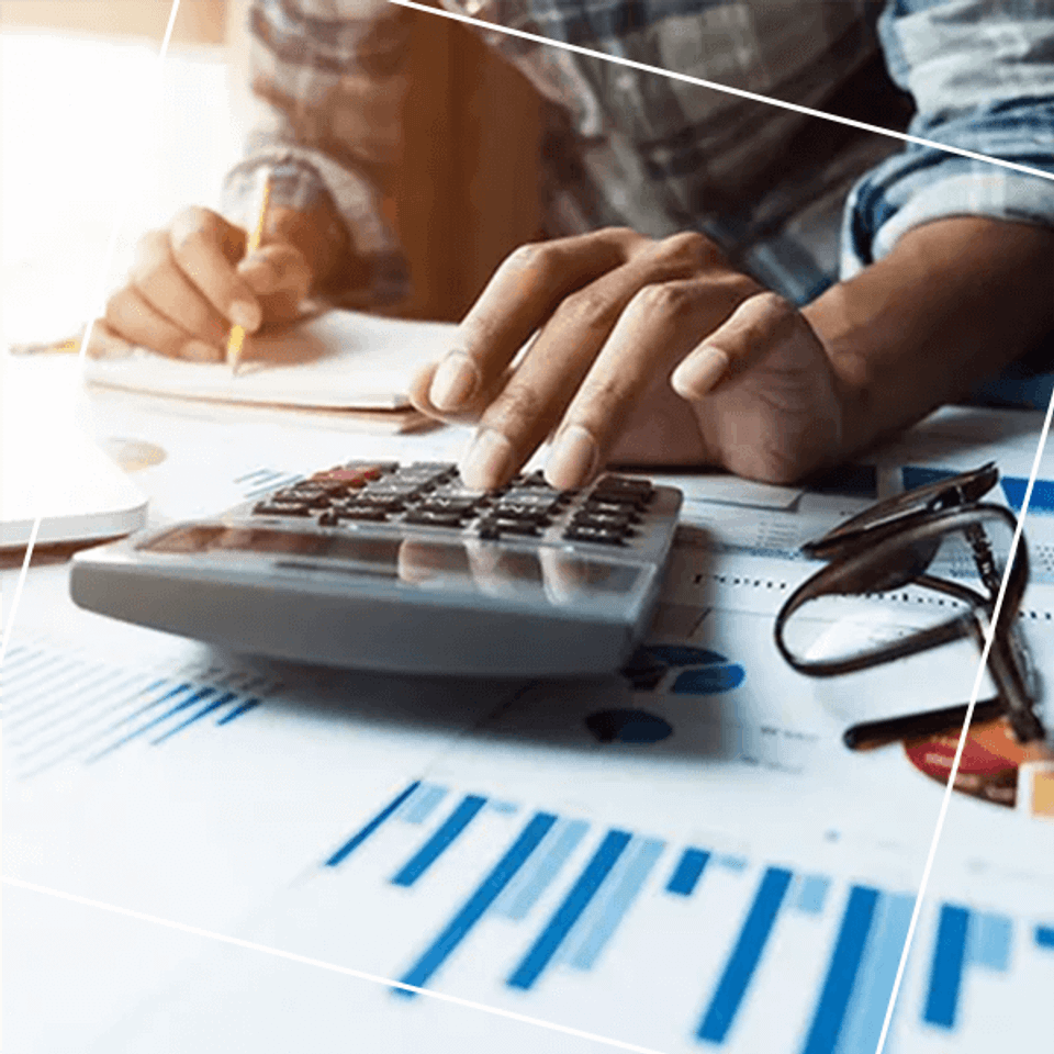 Person using desk calculator