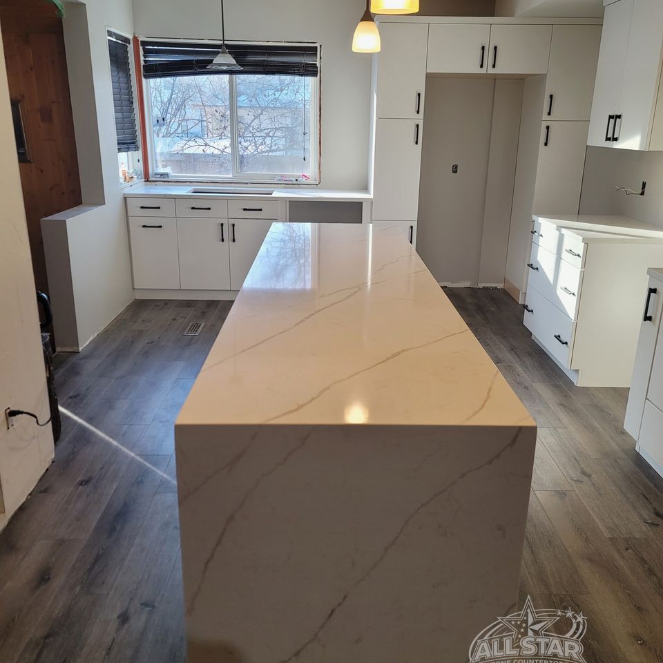 White kitchen island with custom countertop installation in Houston, TX