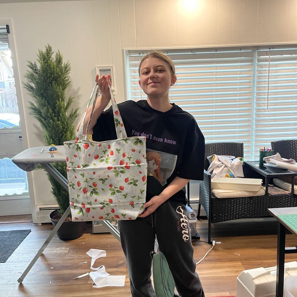 Proud sewing student