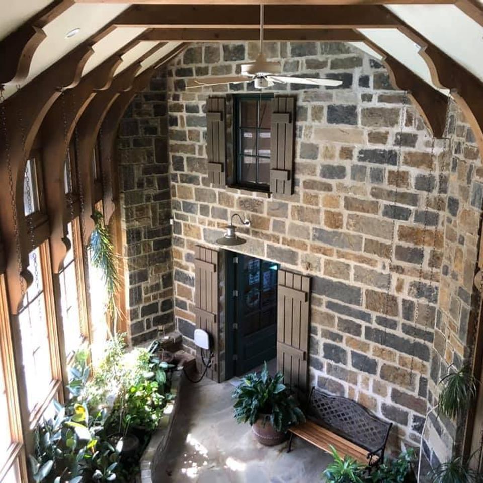3d solutions general contractors   tulsa oklahoma   country style stone wall wood beam vaulted enclosed connecting walkway build