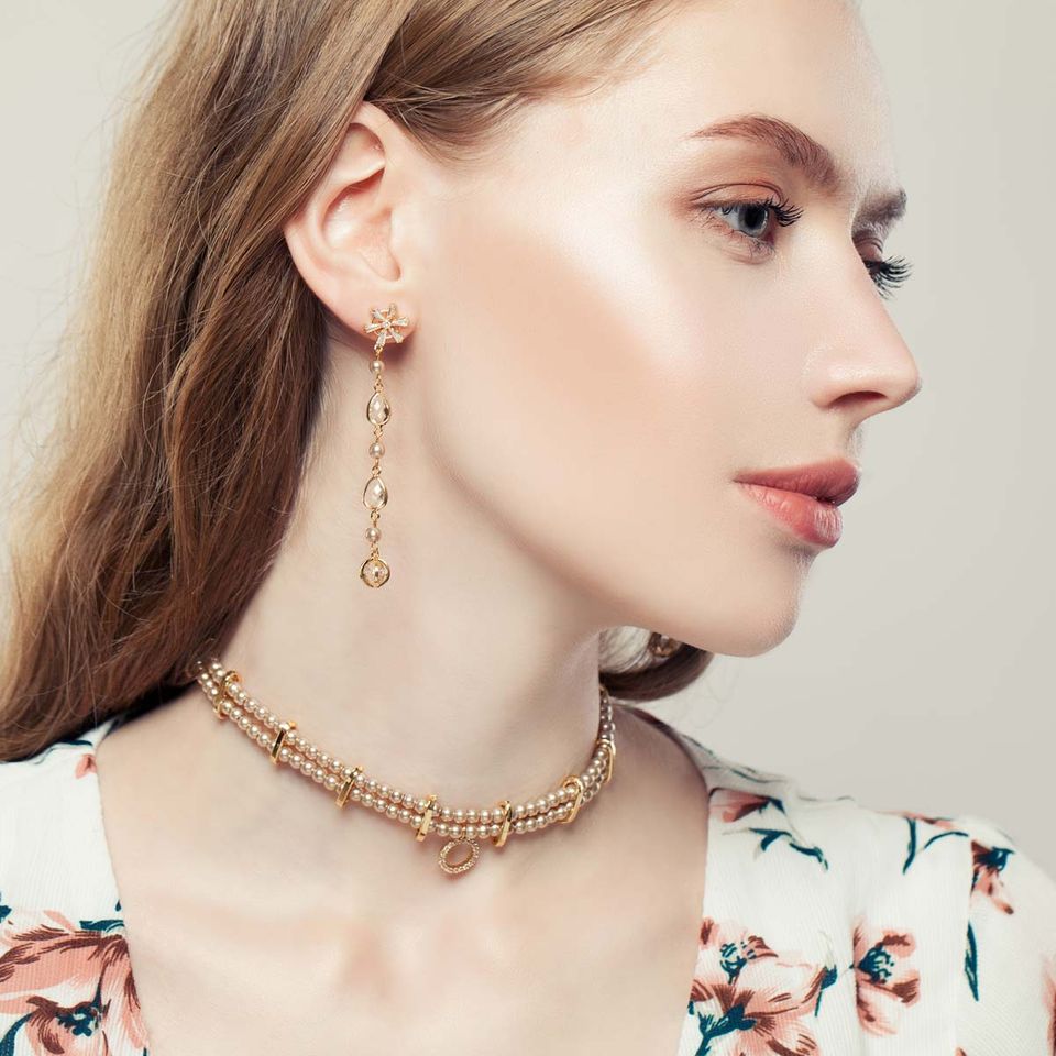 Woman wearing earrings and necklace