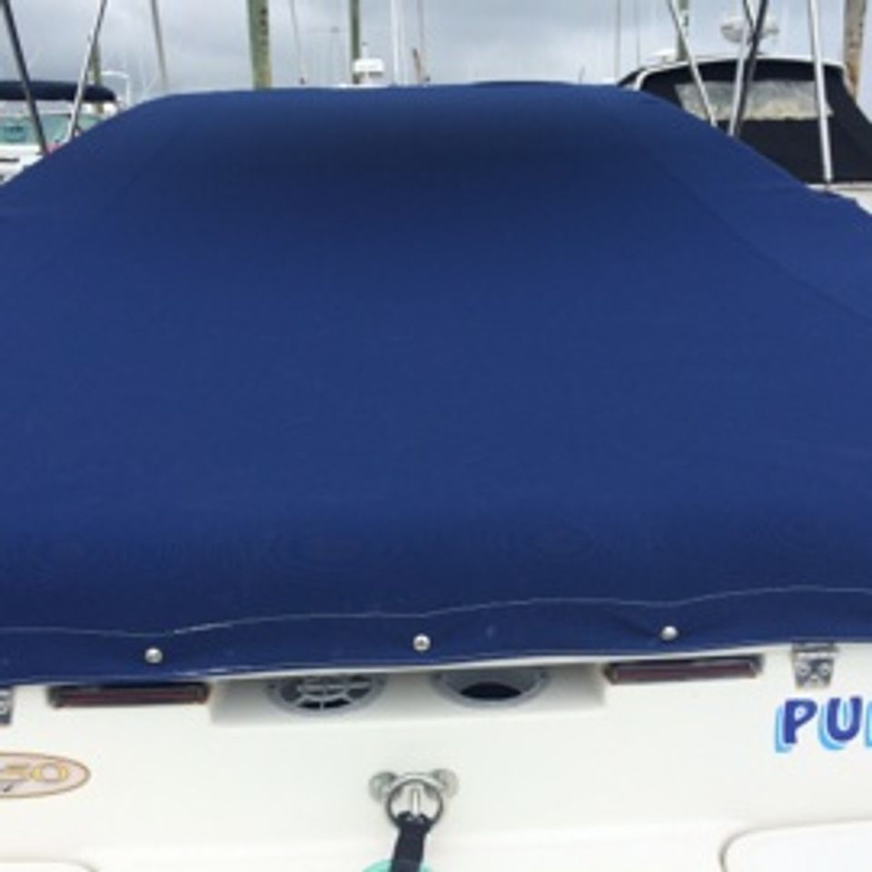 Speedboat canvas snap cover closeup view from stern