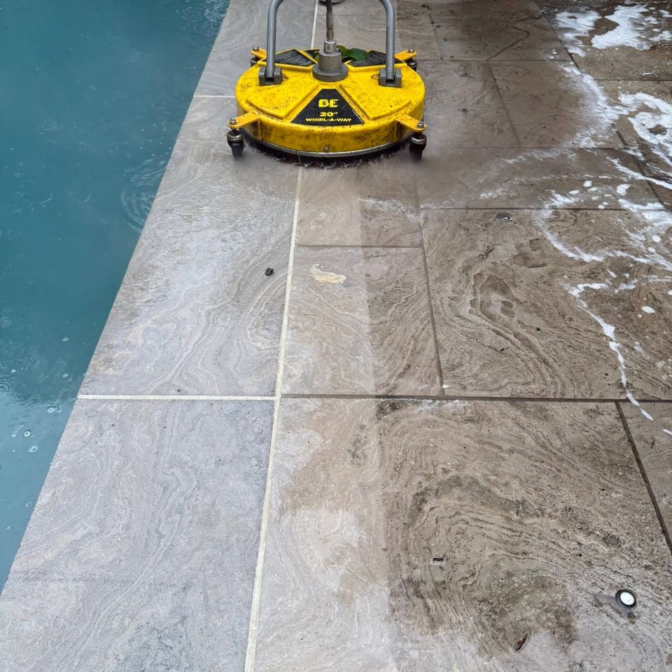Surface cleaner pressure washing a stone pool deck at a Tillsonburg Ontario home