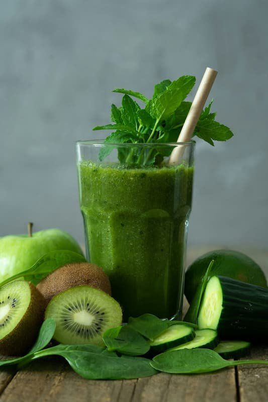 Green smoothie with kiwis and cucumbers about 