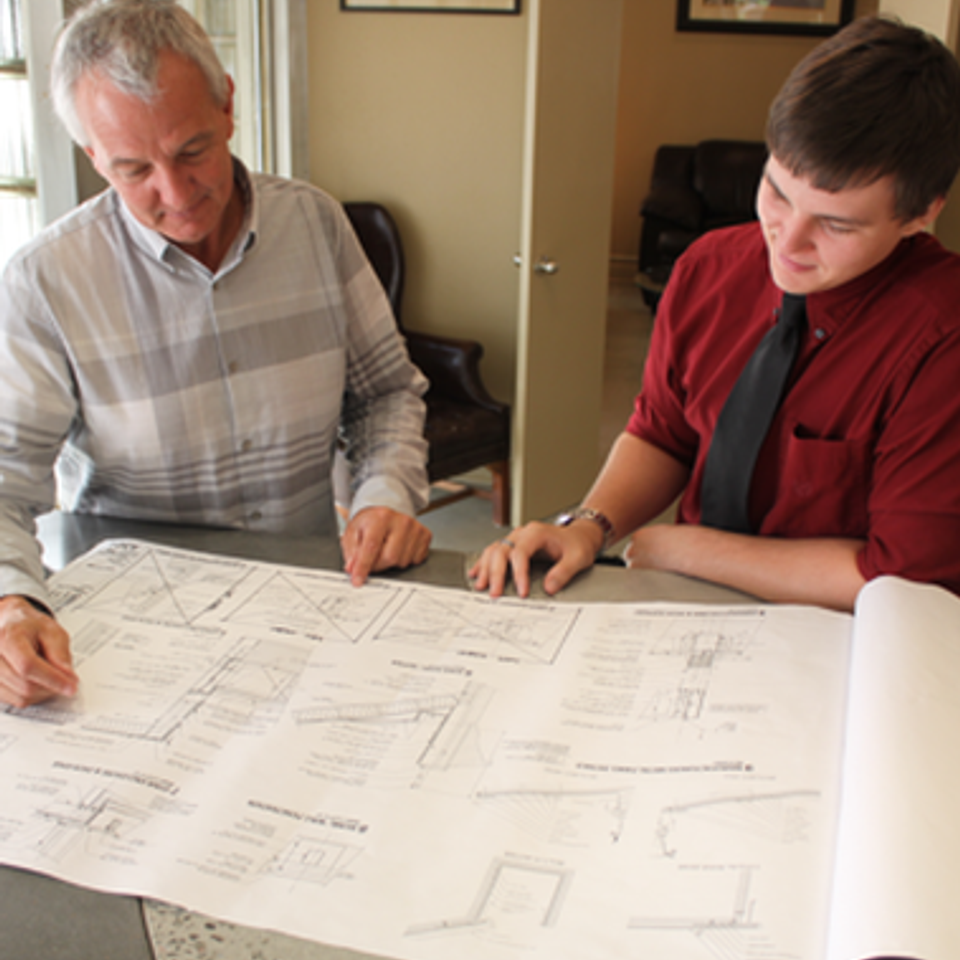 Barron and mcclary gc   tulsa  oklahoma   general contractors   about us   kurt and grant looking at plans20170727 2497 ndbw2g