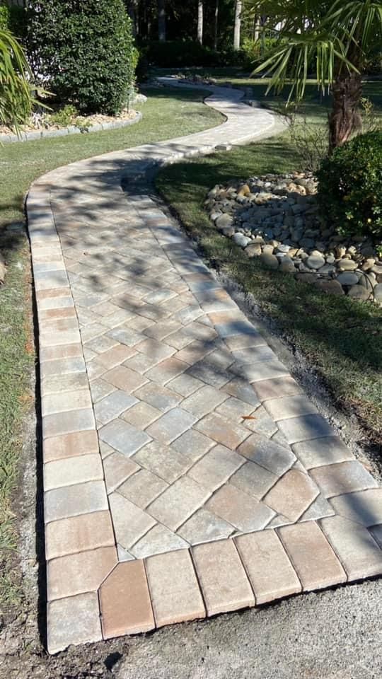 "Paver sidewalk constructed by Gabino Landscaping in Myrtle Beach, South Carolina."