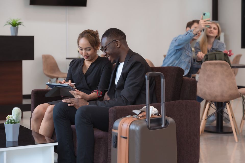 Business travelers in airport lounge