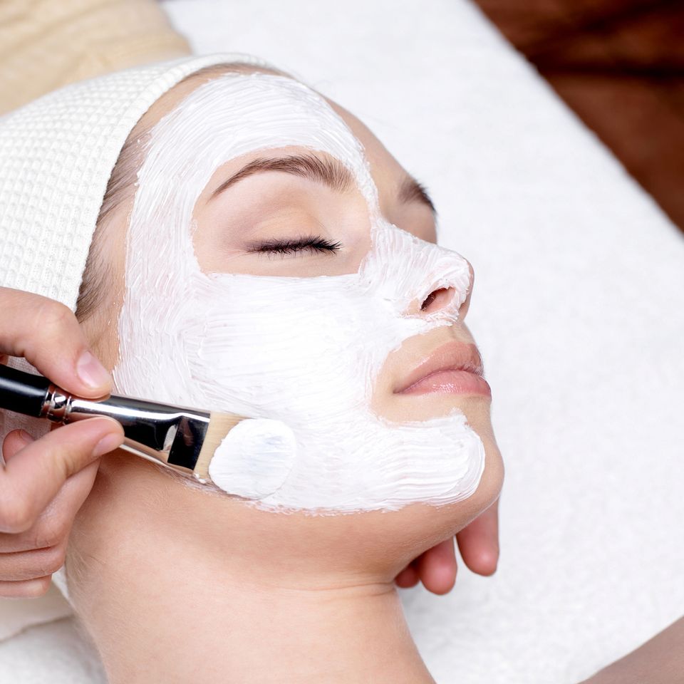 Cosmetologist applying skincare treatment