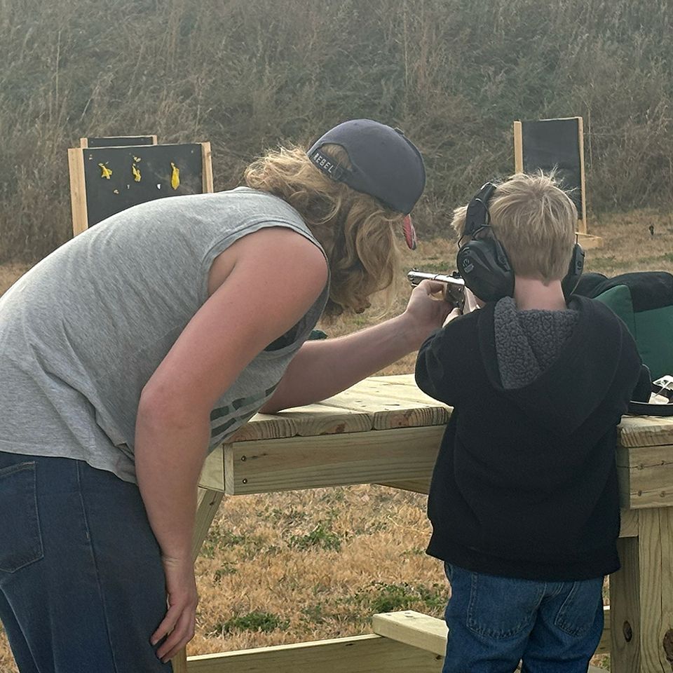 Dad and boy bb gun