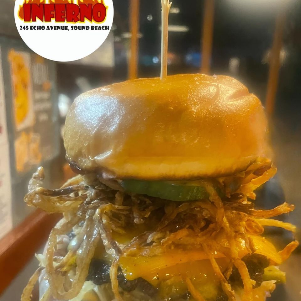 A loaded up burger from Inferno The Restaurant in Sound Beach