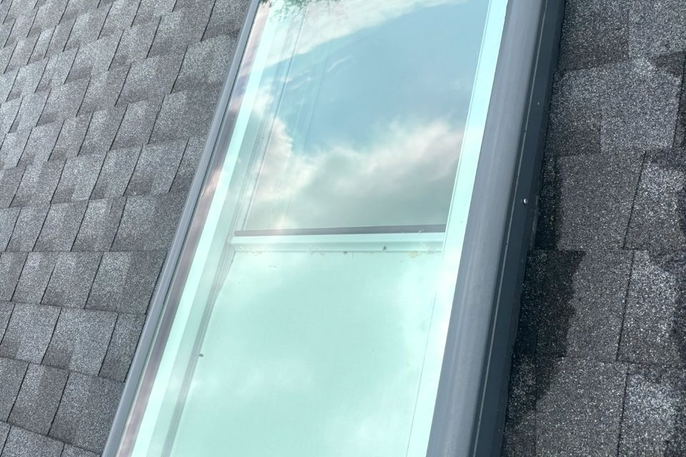 Clean skylight glass on shingle roof after exterior window cleaning in Harrisburg PA