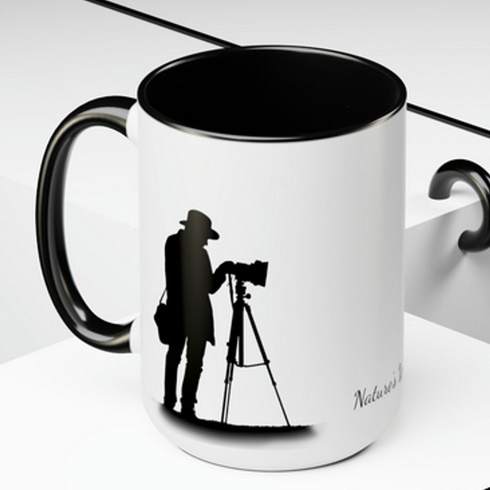 Man filming black inside mug