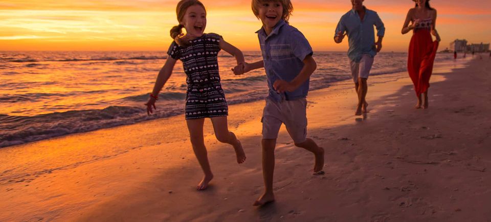 Family running on beachjennifer6