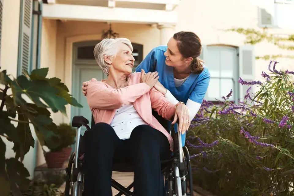 Senior Outdoors with Caregiver