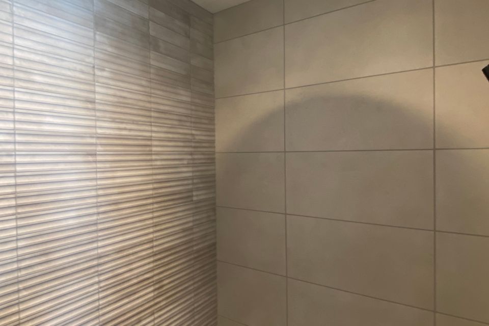 Daltile indoterra 12x24 flat wall tiles and 2x9 fluted tiles natural sahara beige grout