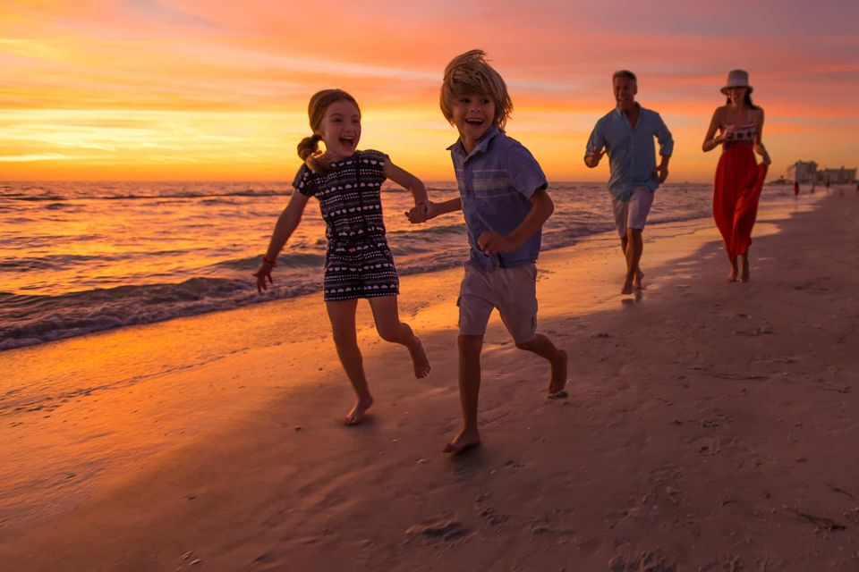 Family running on beachjennifer6