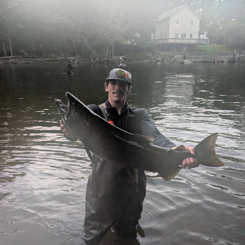 fisherman with salmon in new york