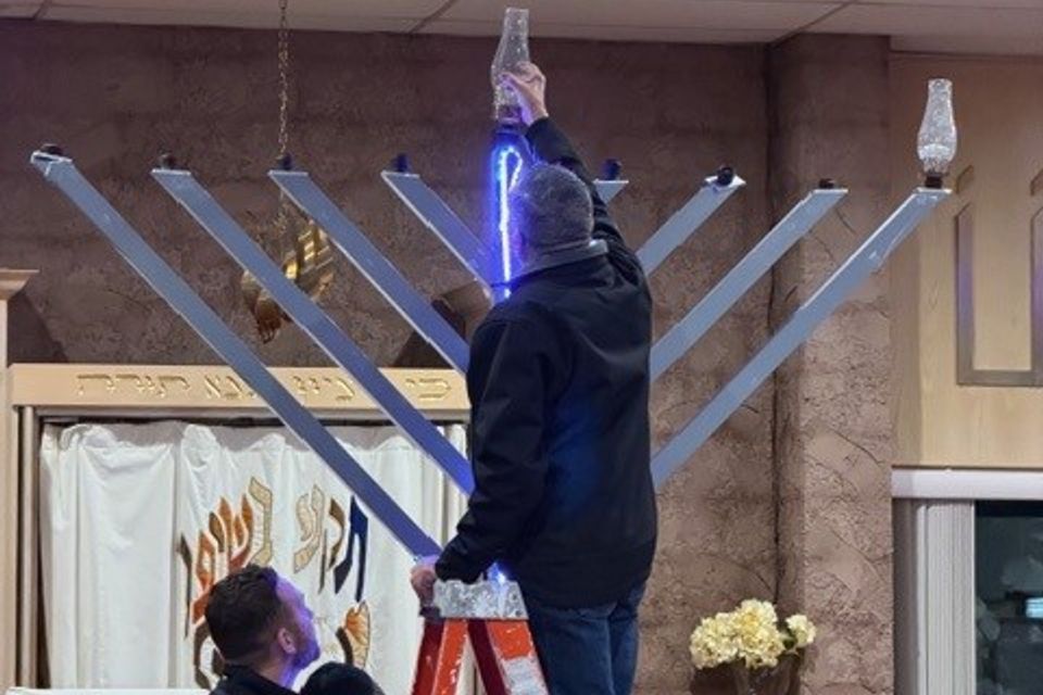 Mayor nicastro lighting the first candle