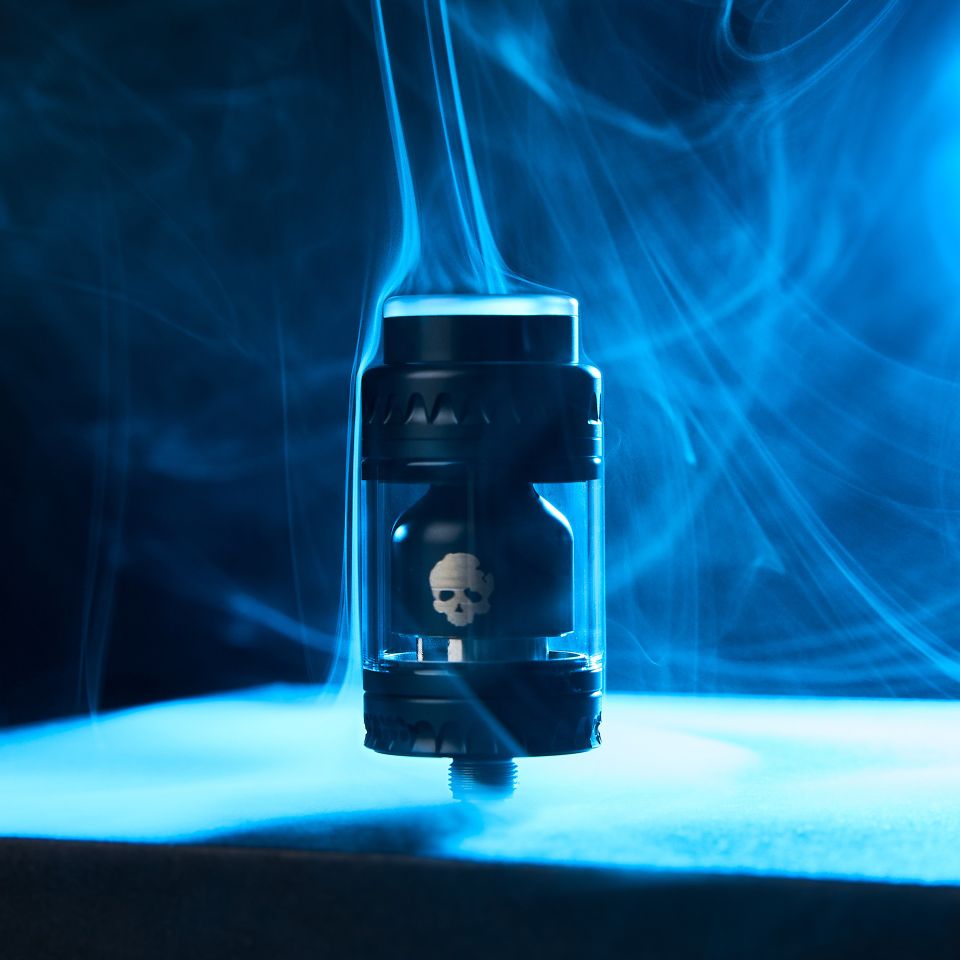Smokey vape tank producing vapor clouds.