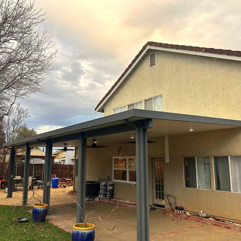 Attached covered patio extension with recessed lighting in Elk Grove California
