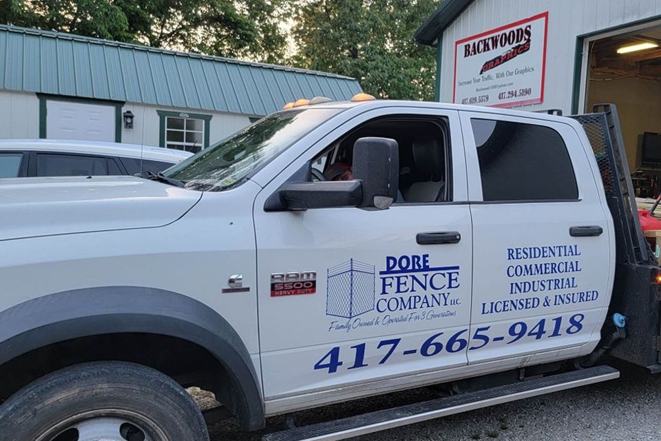 Dore fence co logo on truck 2