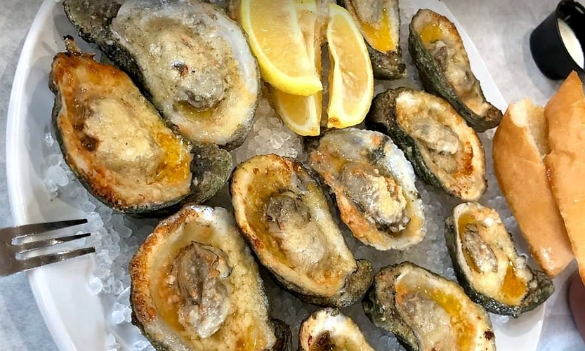 Grilled oysters served at Bozo’s