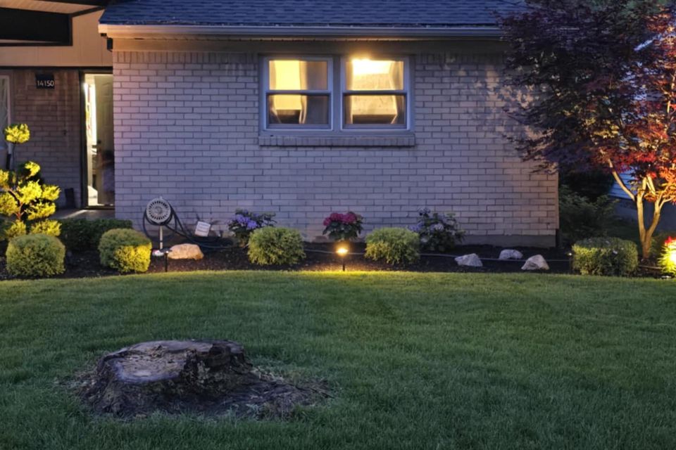 Landscape lighting wide shot done by Vic's Landscaping of Michigan