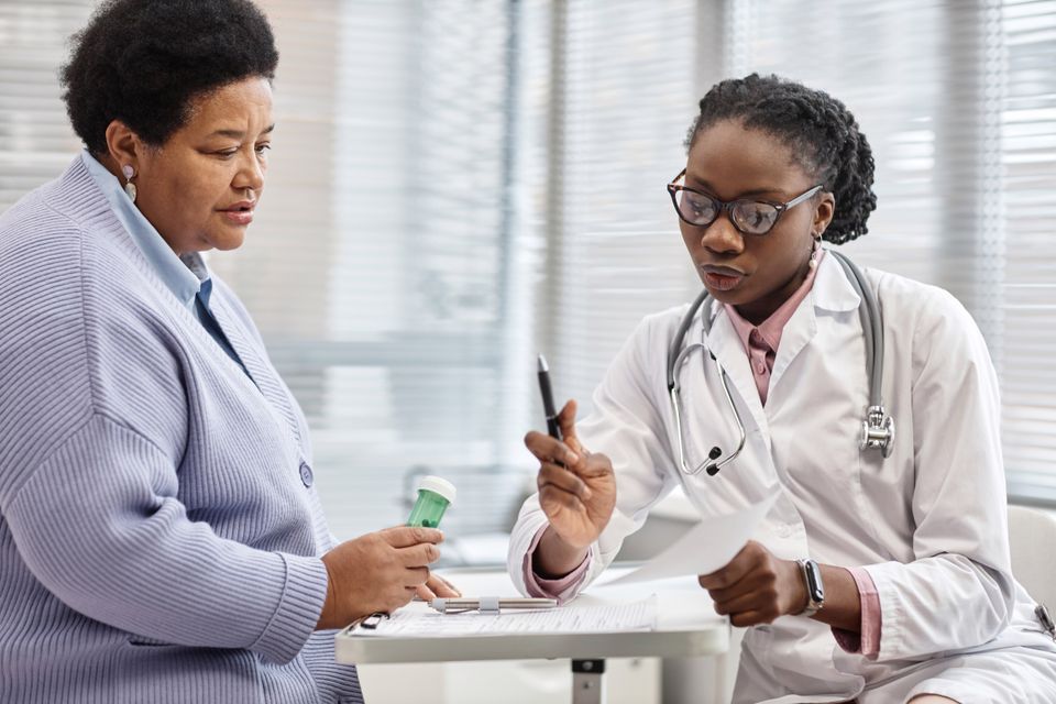 Doctor showing prescription to female patient 2024 01 19 18 25 27 utc (1)