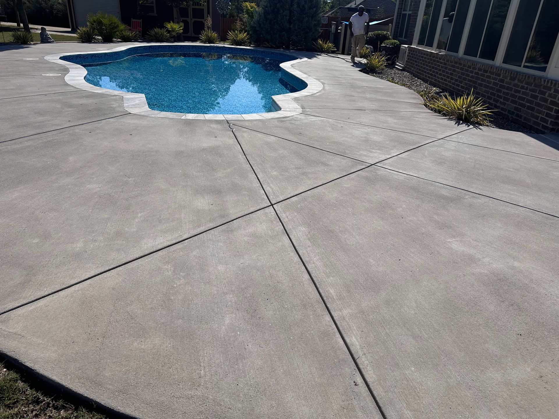 Before photo of a large pool deck in Beech Island SC before decorative concrete resurfacing