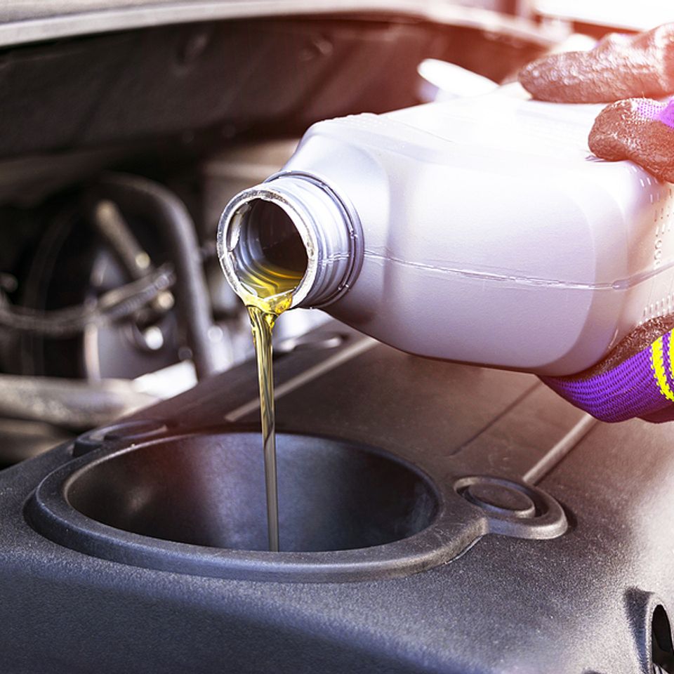 Bigstock change the oil hand mechanic  316173631