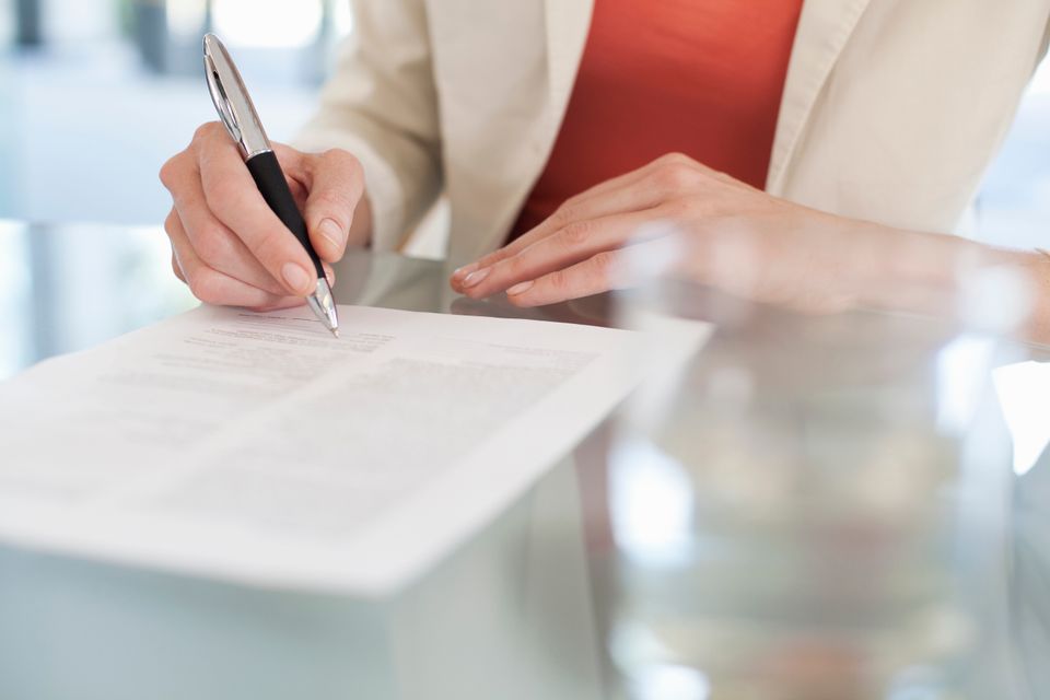 Cropped image of businesswoman signing paperwork 2024 06 04 19 43 31 utc