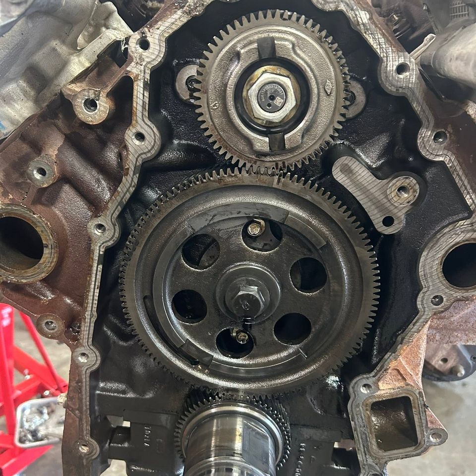 Diesel engine timing gear assembly exposed during truck engine rebuild in Arab Alabama