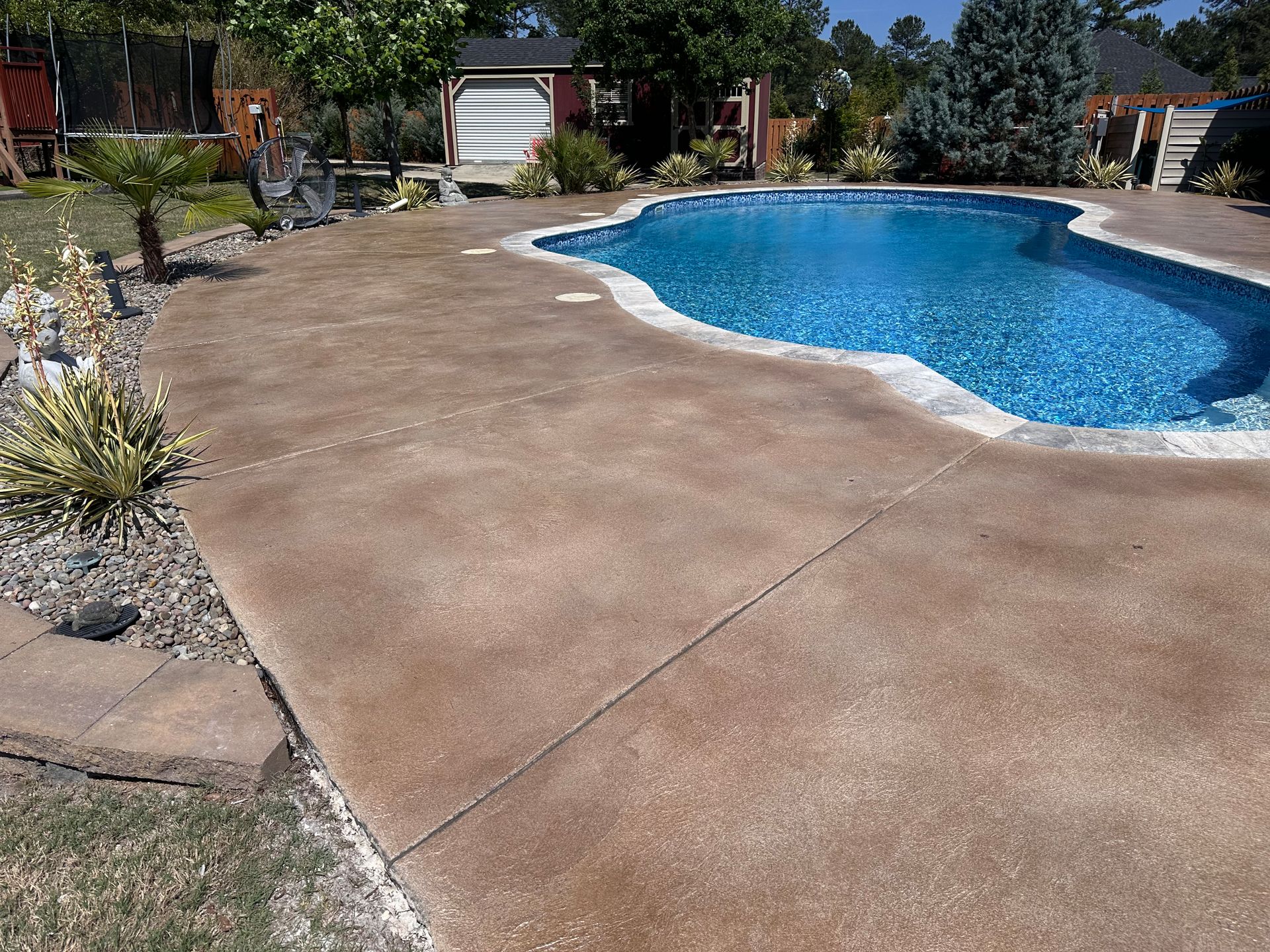 After photo of Beech Island SC pool deck with warm decorative concrete finish
