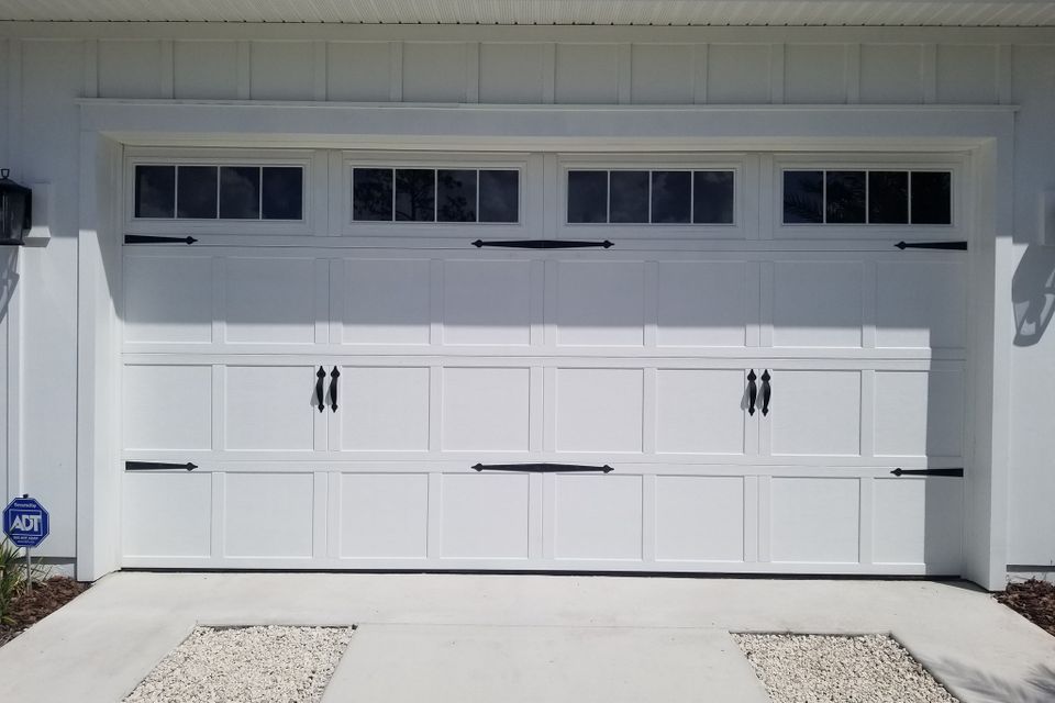 Tree of life2 retractable screen1garage door white