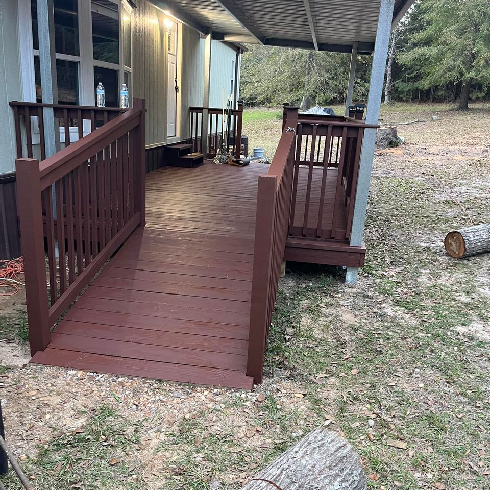 Completed covered back porch with custom metal roof and steel framing built by Marquez Welding in Houston