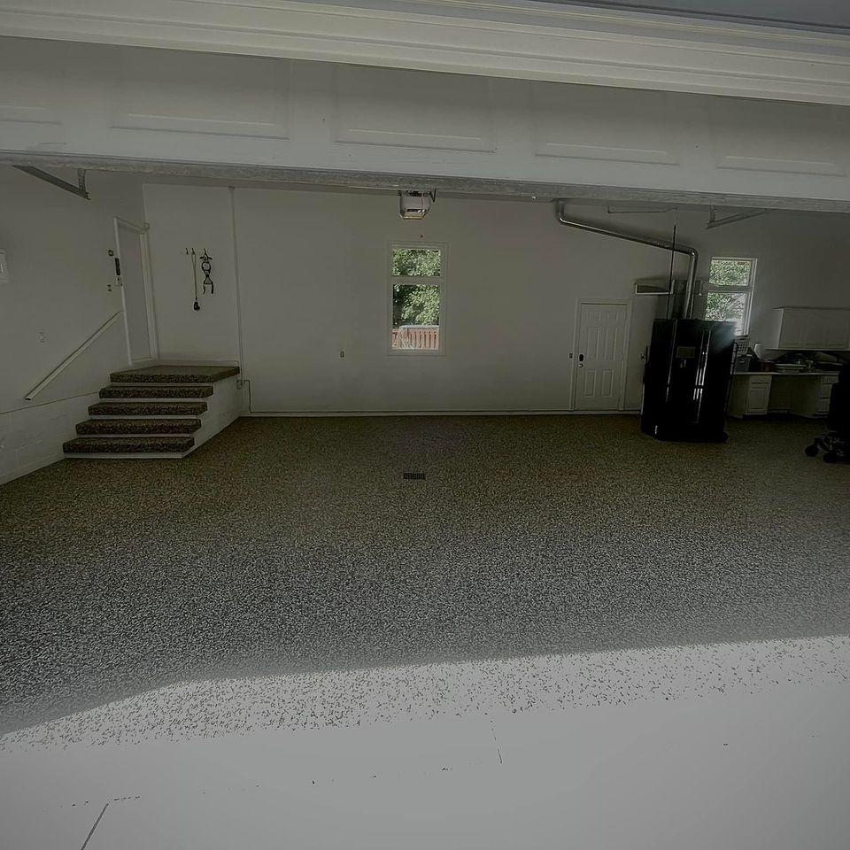 Spacious garage finished with an EverStone decorative stone floor.