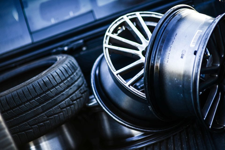 Image of tire and 2 rims.