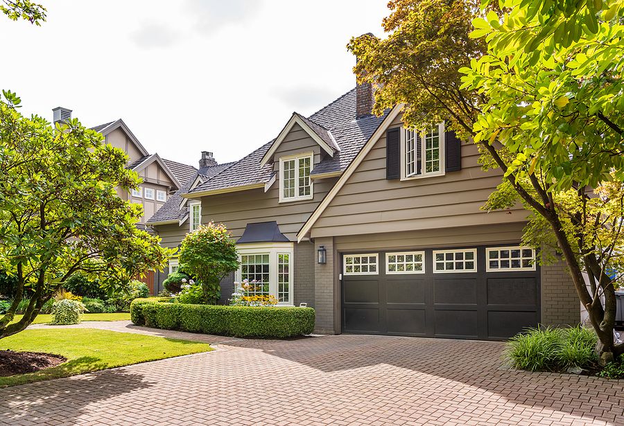 Bigstock houses in suburb at summer in  318771511 (1)
