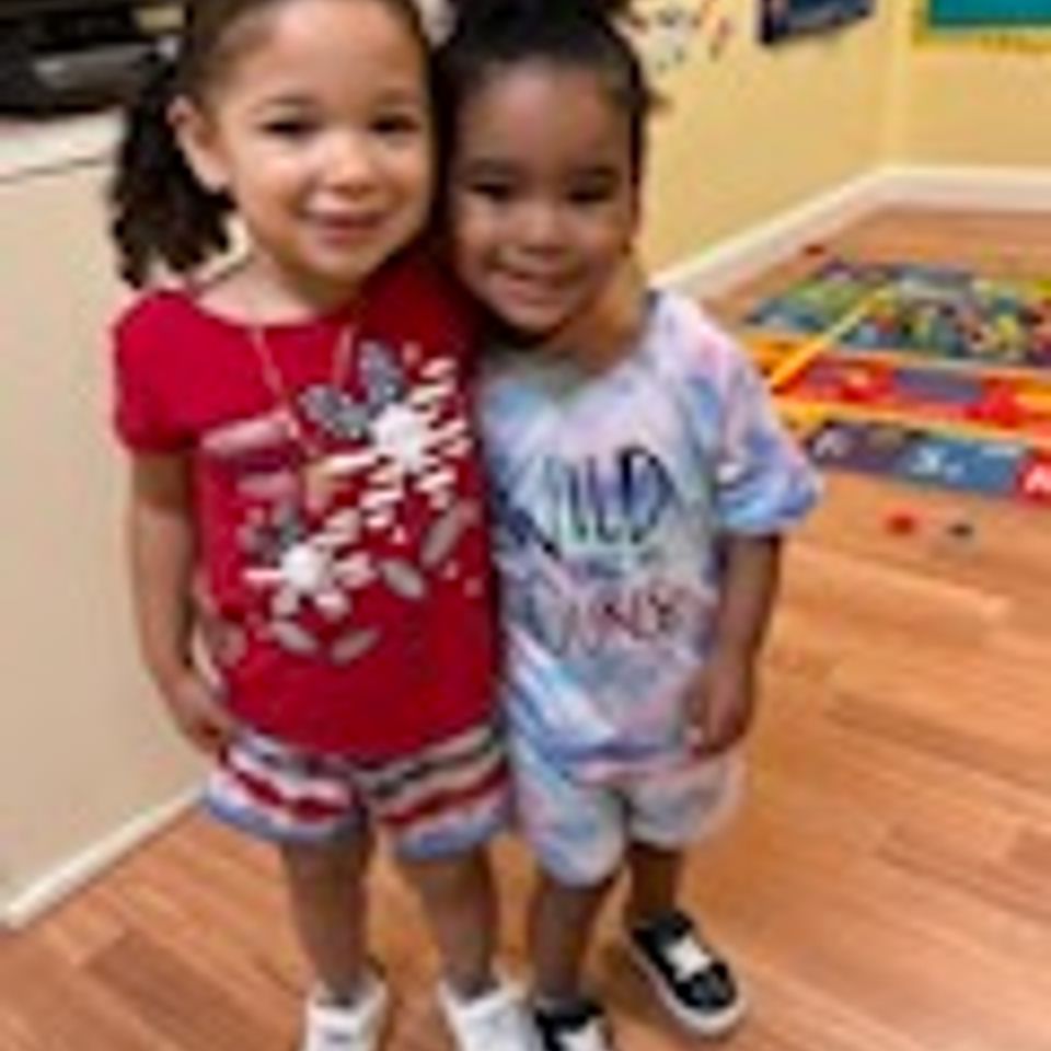 Precious kids of merrick too two cute girls hugging